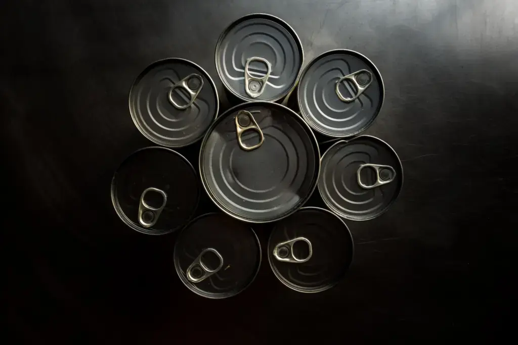 black and white round plastic containers