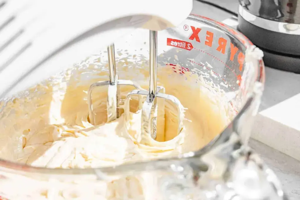 clear glass cup with yellow liquid