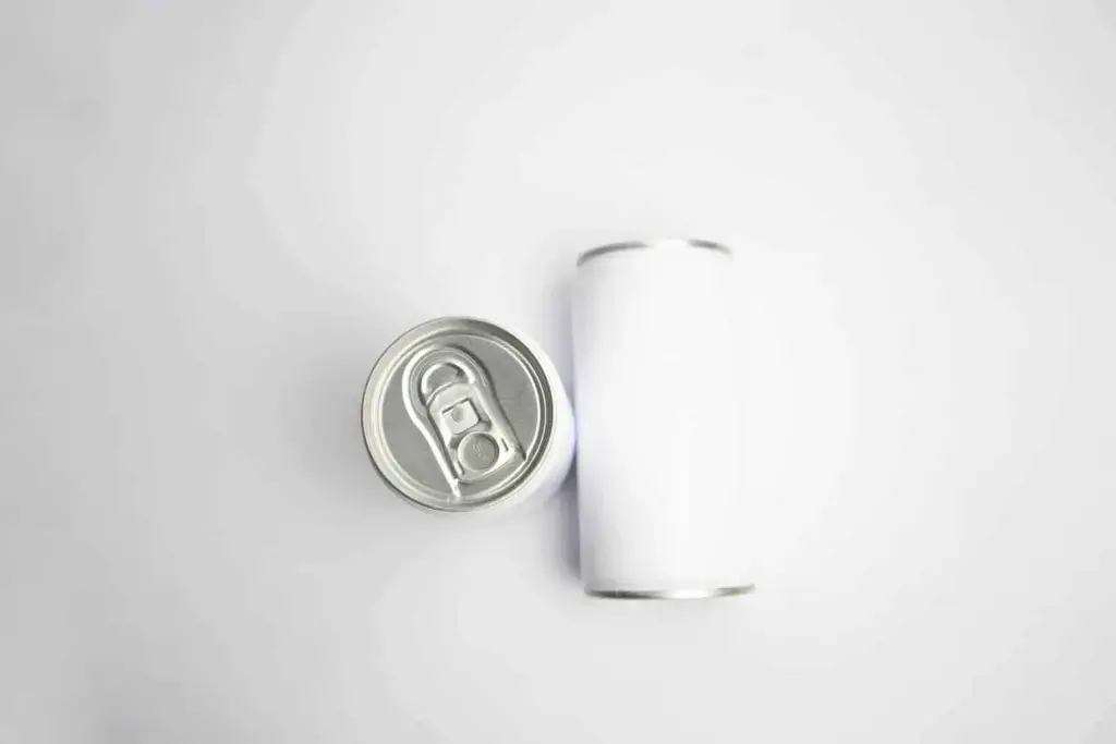 silver can on white table