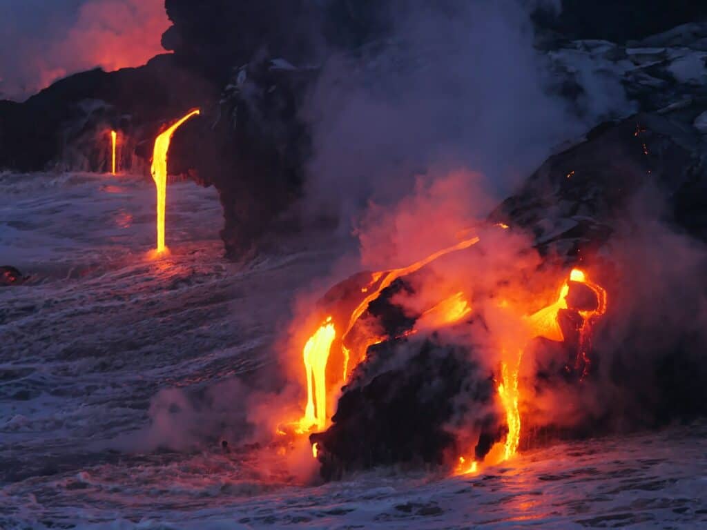 photo of lava flowing on land