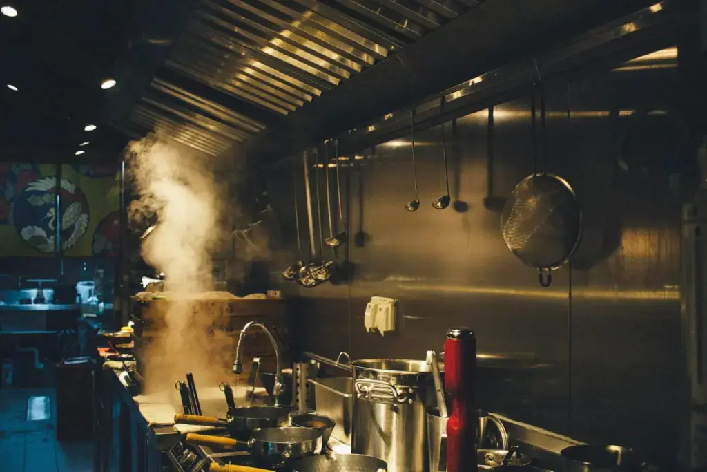 stainless steel cooking pots on stove